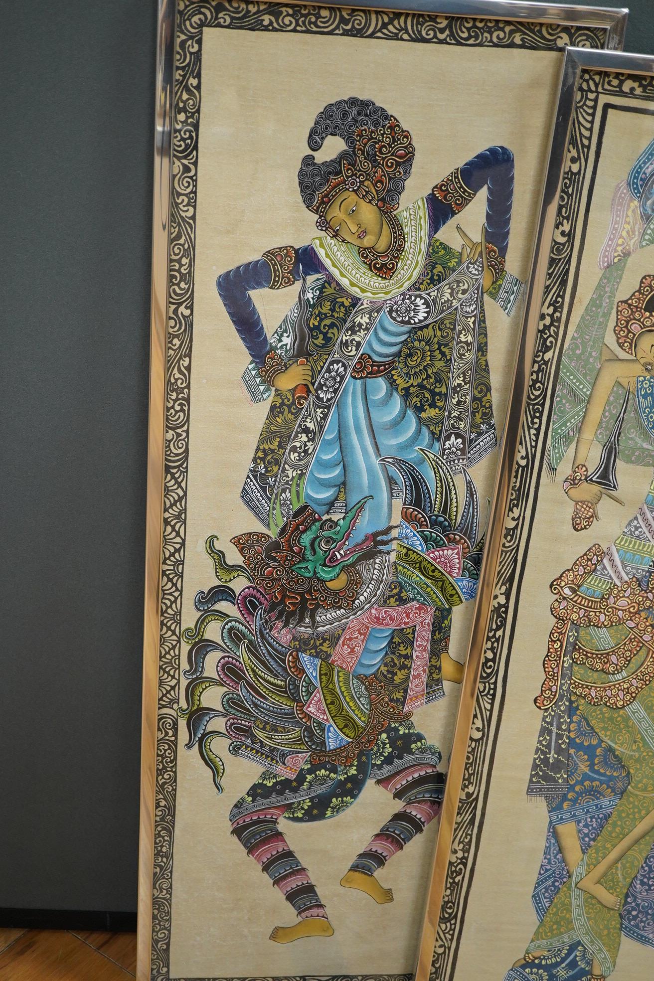Two highly decorative coloured Thai cut-out pictures and three Thai paintings on fabric of Thai Dancers, largest 82 x 28cm